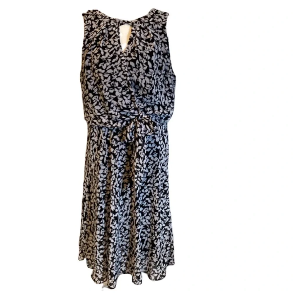 Karin Steven’s sleeveless black/white patterned lined dress. Tie at neck & waist